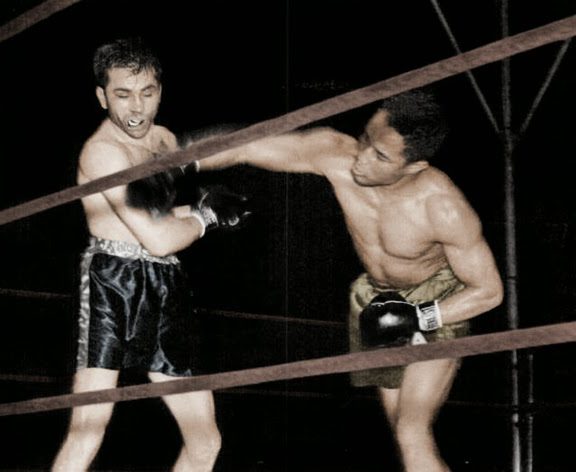 Henry Armstrong campeón pluma, ligero y welter.